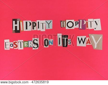 Hippity Hoppity Easters On Its Way Written On Scraps Of Magazine Paper On A Pink Background