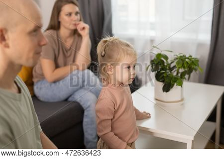 Deaf Child Girl With Cochlear Implant Studying To Hear Sounds And Have Fun With Mother And Father - 