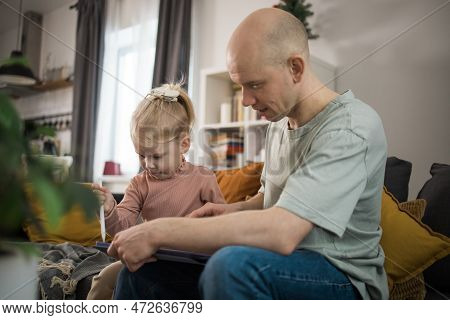 Deaf Child Girl With Cochlear Implant Studying To Hear Sounds And Have Fun With Father - Recovery Af