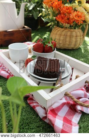 Chocolate Cake Served On A White Plate