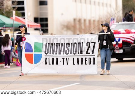 Laredo, Texas, Usa - February 19, 2022: The Anheuser-busch Washington's Birthday Parade, Women Carry