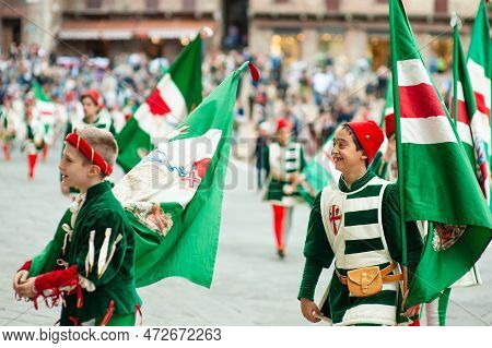 Siena, Italy - July 2013: The Noble Contrada Dell'oca On The Corteo Storico, A Historical Costume Pa