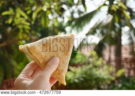 Authentic Sri Lankan Vegetable Roti In Hand.