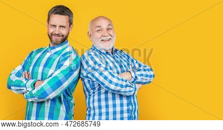Two Generation Family Men On Background, Copy Space. Photo Of Two Generation Family Men