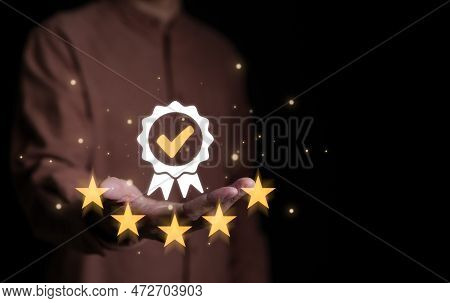 Businessman Hand Shows The Sign Of The Top Service The Best Quality Assurance, Quality Control, Stan