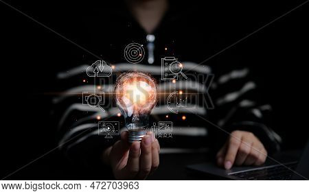 Woman Hand Holding Creative Light Bulb With Icons Global Internet Connection On Plan Strategy, Busin