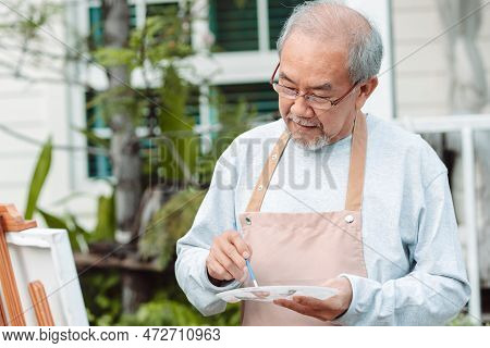 Asian Caregiver Helping Senior Male From Falling On The Ground. Older Elderly Man Patient Having Acc