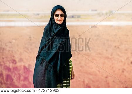 Caucasian Woman Tourist Stand On Maharlu Pink Salt Lake Shore. Travel Destination Iran In Shiraz