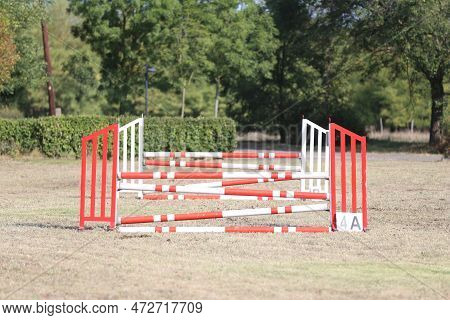 Show Jumping Poles Obstacles, Barriers, Waiting For Riders On Show Jumping Training. Horse Obstacle 