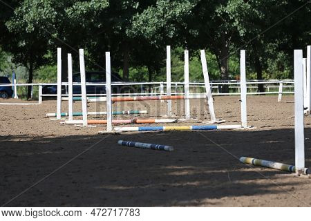 Show Jumping Poles Obstacles, Barriers, Waiting For Riders On Show Jumping Training. Horse Obstacle 
