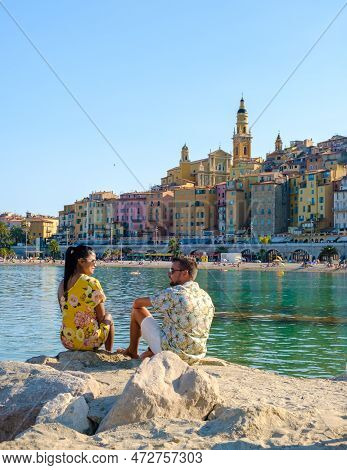 Menton France, Couple Men And Woman On Vacation At The Cote D Azur France, View On Old Part Of Mento