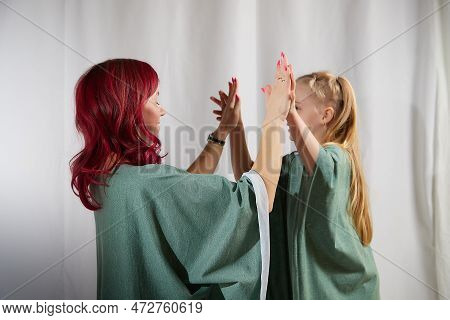 Amazing Pretty Mother And Daughter Having Fun And Dacncing Together. Red Haired Mom And Small Little