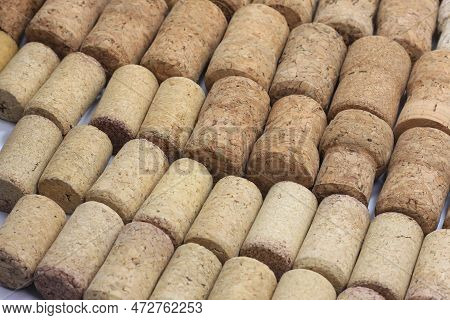 Abstract background of wine corks with corks from red wine bottles and corks from white wine bottles