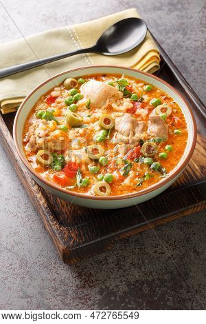 Traditional Puerto Rican Asopao De Pollo Chicken And Rice Stew Is Filling And Flavorful Closeup On T