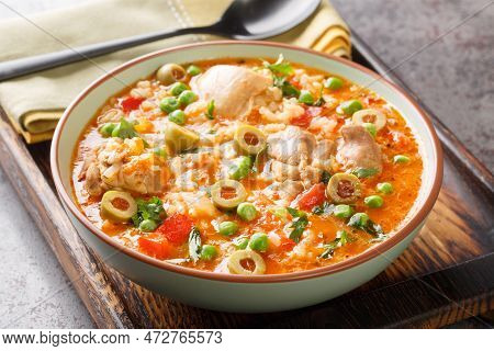 Puerto Rican Dish Asopao De Pollo, A Cross Between Soup And Paella, Is An Easy, Hearty One-dish Meal