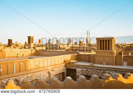 Yazd, Iran - 19th June, 2022: Views Of Tourist In Cafe. Wind Catchers , Domes, Minarets Of Yazd At S