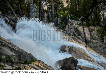 Cascades Bursts Against Rocks Along Leconte Falls In Tuolumne River In Yosemite