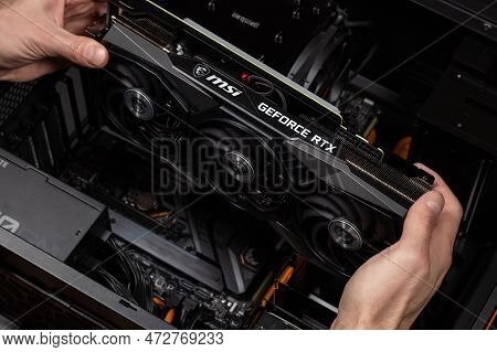 Ukraine, Dnipro, February 23, 2023: Msi Geforce Rtx Graphics Card, Installing Video Card In An Open 