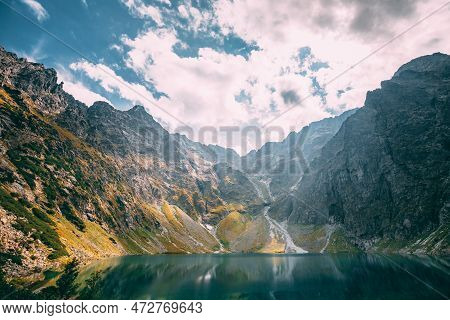 Tatra National Park, Poland. Calm Lake Czarny Staw Under Rysy And Summer Mountains Landscape. Beauti