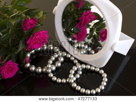 Pearl Bracelets, Bouquet Of Roses And A Mirror