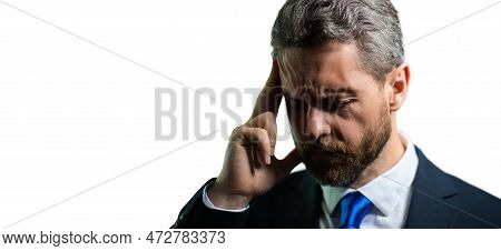 Millennial Businessman Having Headache. Business Man In Suit Suffer From Migraine Or Headache. Tired