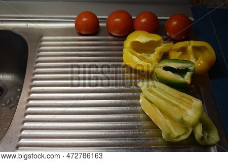 Ripe Green And Yellow Cut Paprika Tomatoes
