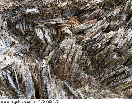 Stone Layers Close-up, Stone Background. Compressed Rock Layers Formation In Various Colors And Thic
