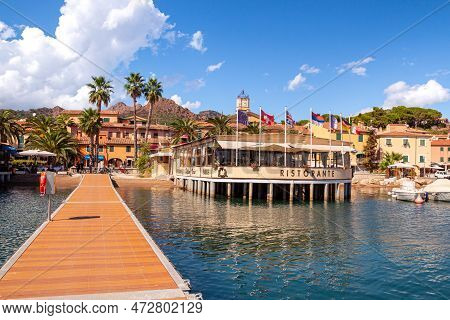 Porto Azzurro Island Of Elba Italy - 19 September 2021 Cityscape Of Harbor Of Porto Azzurro
