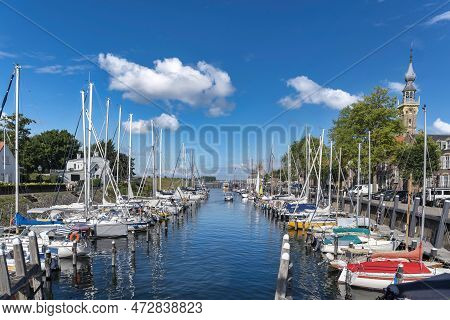 Veere Marina, In The Background The Historic Town Hall. Veere Is A City In The Province Of Zeeland I