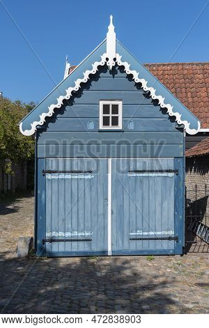 Typical Wooden Facade Of A Garage In The Wijngaardstraat In Veere. Veere Is A City In The Province O