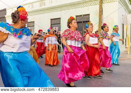 Matamoros, Tamaulipas, Mexico - February 25, 2023: Fiestas Mexicanas Parade, Senior Women Wearing Tr