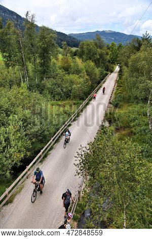 Strobl, Austria - August 2, 2022: Cyclists Ride The Salzkammergut Radweg Long Distance Cycling Route