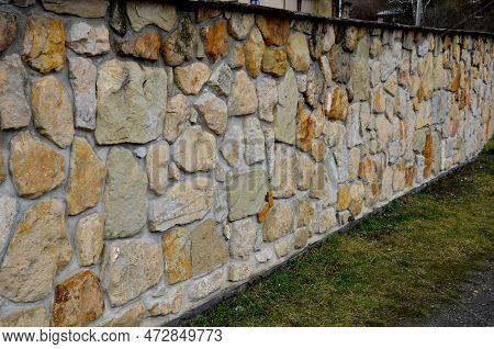Retaining Walls And Terraces With Trellises And Roses. Rectangular Trimmed Hedge Of Boxwood On The R