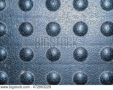 Texture Of A Black Plastic Surface With Bulges. Black Plastic. Background Image. Place For Your Text