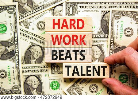 Hard Work Beats Talent Symbol. Concept Words Hard Work Beats Talent On Wooden Block. Beautiful Backg