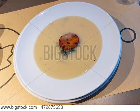 Gourmet Portuguese Caldo Verde With A Piece Of Chorizo Meat.