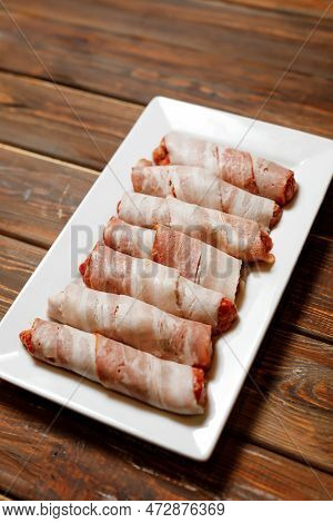 Somebody Is Preparing The Meat To The Visitors Of The Restaurant.