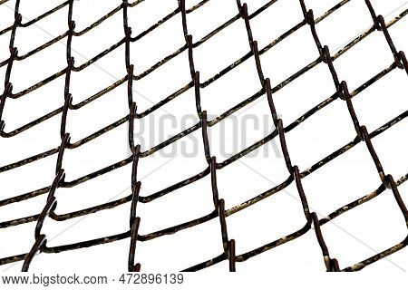 The Texture Of The Metal Mesh. Torn, Destroyed, Broken Metal Mesh On A White Background