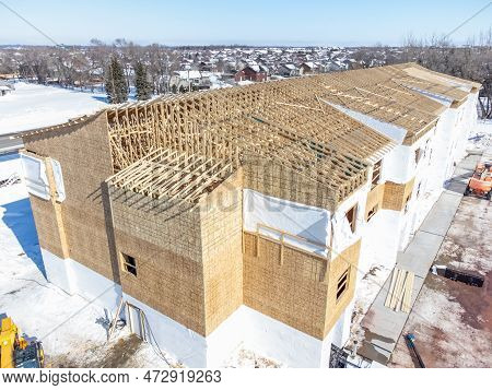 Aerial Drone View Of A Multifamily Apartment Complex Under Construction.