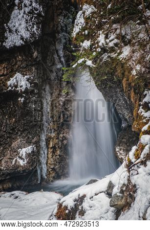 Winter View On Pison Waterfall In Dimaro, Autonomous Province Of Trento, In The Northern Italy. Janu