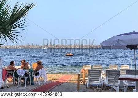 Kinaliada, Turkey - September 15, 2017: Unidentified People Relax On The Beach Of The Sea Of Marmara
