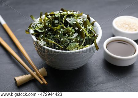 Fresh Laminaria (kelp) Seaweed Served On Black Table