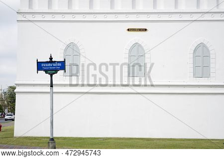 Bangkok, Thailand- 13 Feb, 2023: Thanon Sanam Chai Road Sign And White Wall Of The Grand Palace Bang