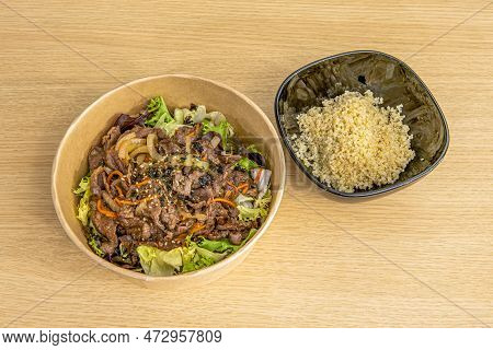 In A Medium Bowl, Combine The Pear, Soy Sauce, Brown Sugar, Sesame Oil, Garlic, Ginger, And Gochujan