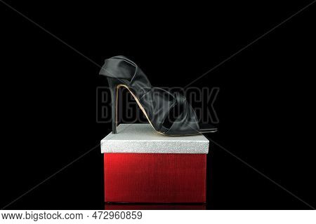 High Heel Shoes  On A Black Background