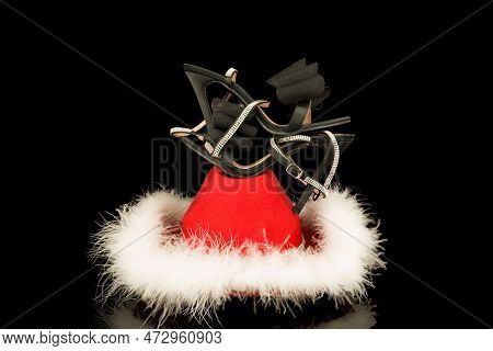 High Heel Shoes  On A Black Background