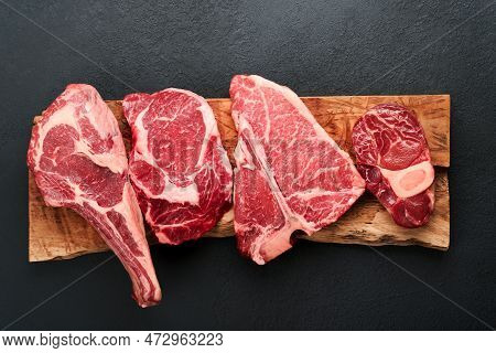 Raw Prime Steaks. Variety Of Fresh Black Angus Prime Meat Steaks T-bone, New York, Ribeye, Striploin