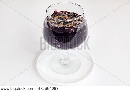 Crystal Glass With Chicha Morada And Cinnamon On Top