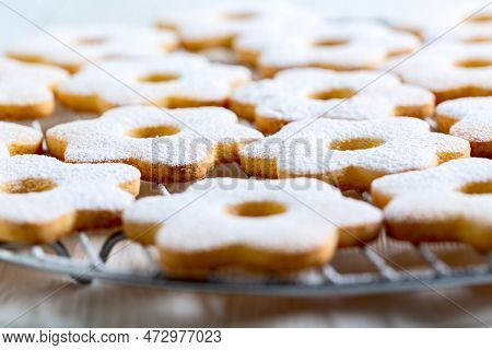Traditional Italian Canestrelli Cookies On A Cooling Grid Close-up, Selective Focus.