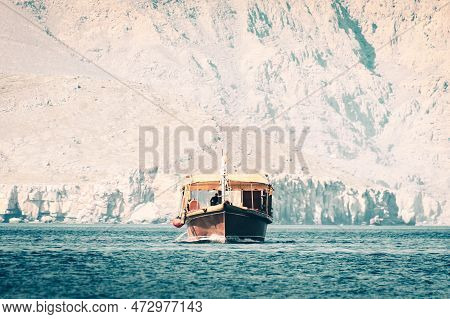 Traditional Tour Boat On Water On Cruise In Persian Gulf. Oman Travel Famous Leisure Activities